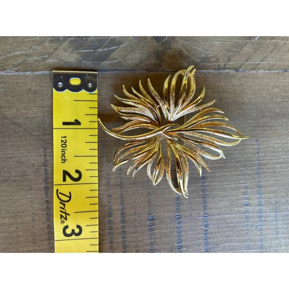 Monet Vintage Gold Tone Sunburst Floral Brooch Textured Petal Pin Statement